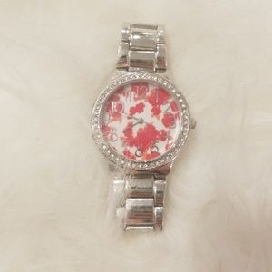 Silver watch with red flowers